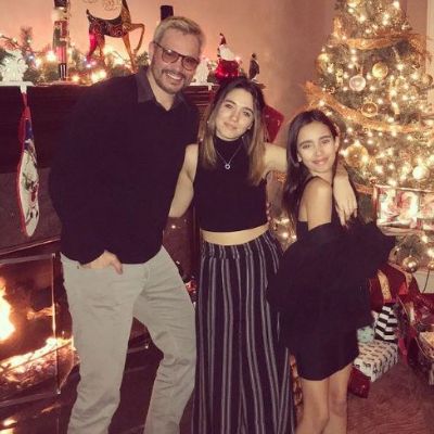 A picture of Kylie Cantrall celebrating 2017 Christmas with her dad & his girlfriend Alisha