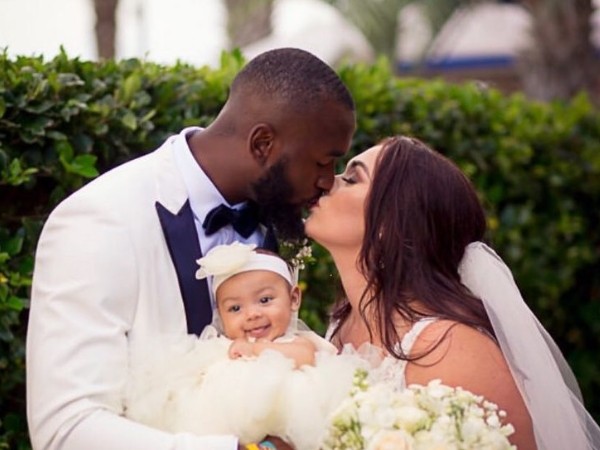 Shaquille Leonard Pictured With His Wife, Kayla Leonard And Their Daughter, Mia, At Their Wedding Ceremony In 2019